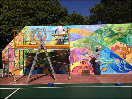 Artists filling in the cartoon